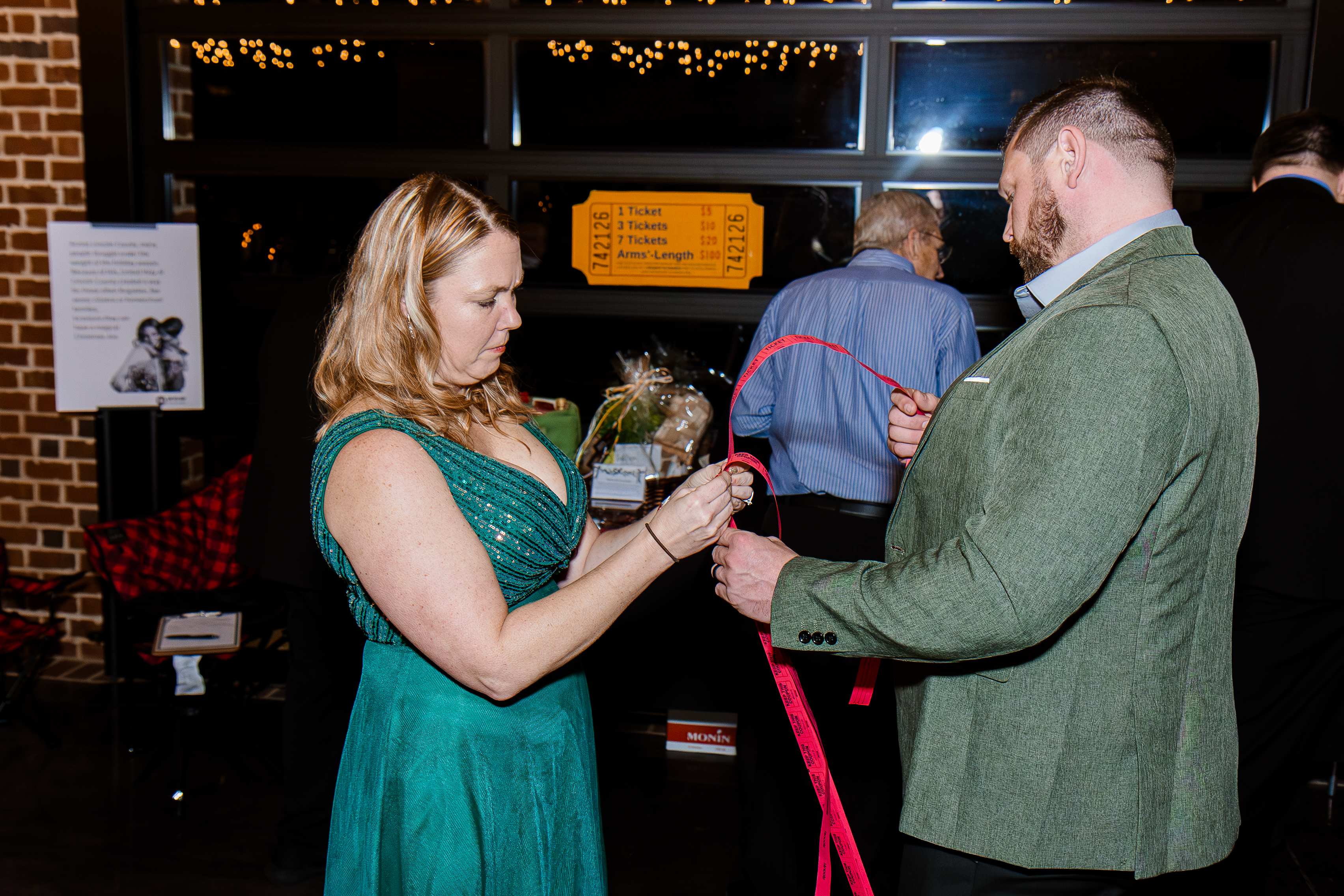 Guests Buying Raffle Tickets at Christmas Gala 2025